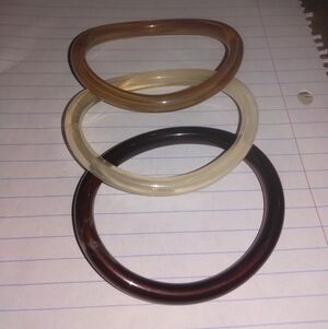 Set of Three Bangle Bracelets in Brown, Cream, and Tan